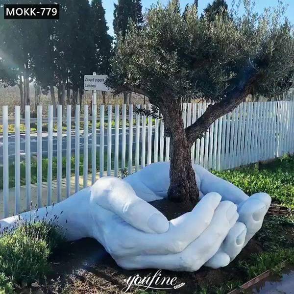 Fiberglass Giant Hands Holding An Olive Tree Sculpture For Sale