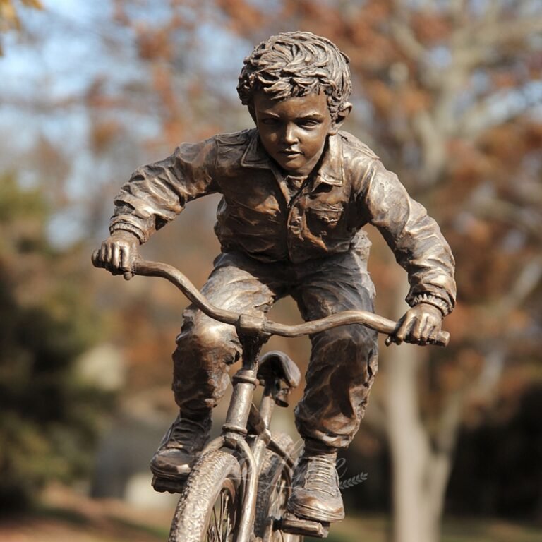 Brown Bronze Boy Riding Bicycle Sculpture Face Detail