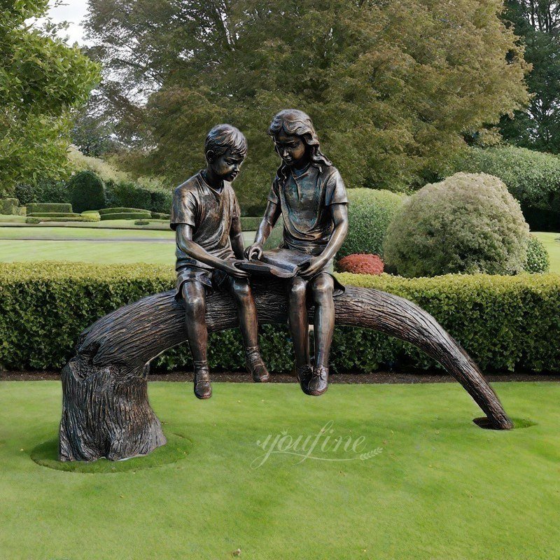 Bronze Boy and Girl Reading Sculpture