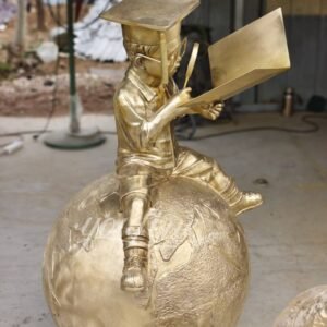 Polished Bronze Little Boy Reading on Earth Sculpture Display