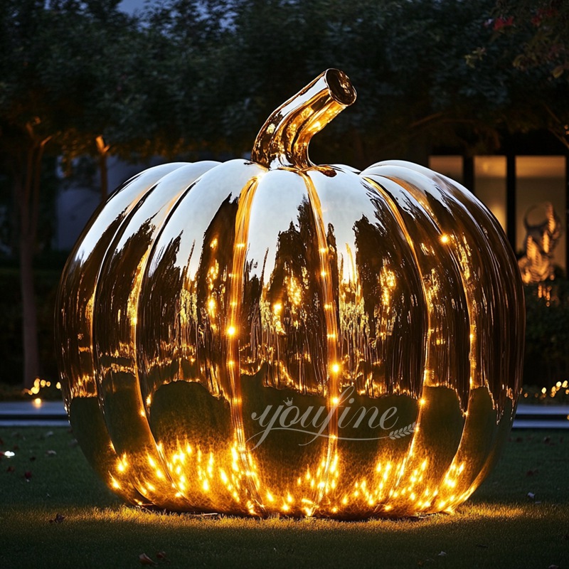 Stainless steel pumpkin sculpture with light 