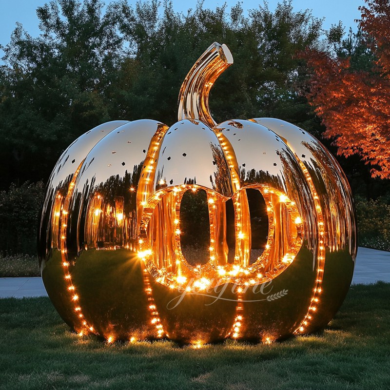 Stainless steel pumpkin sculpture with light 