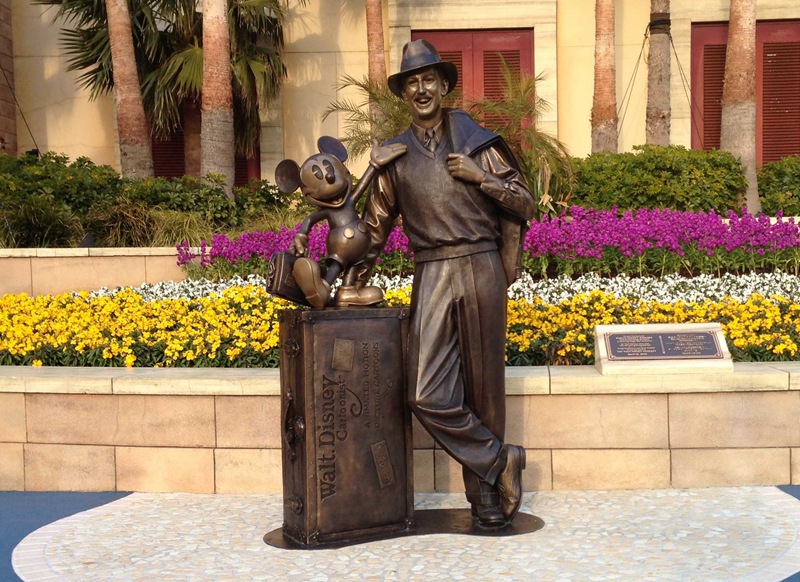 bronze life-size statue of Walt Disney storyteller 