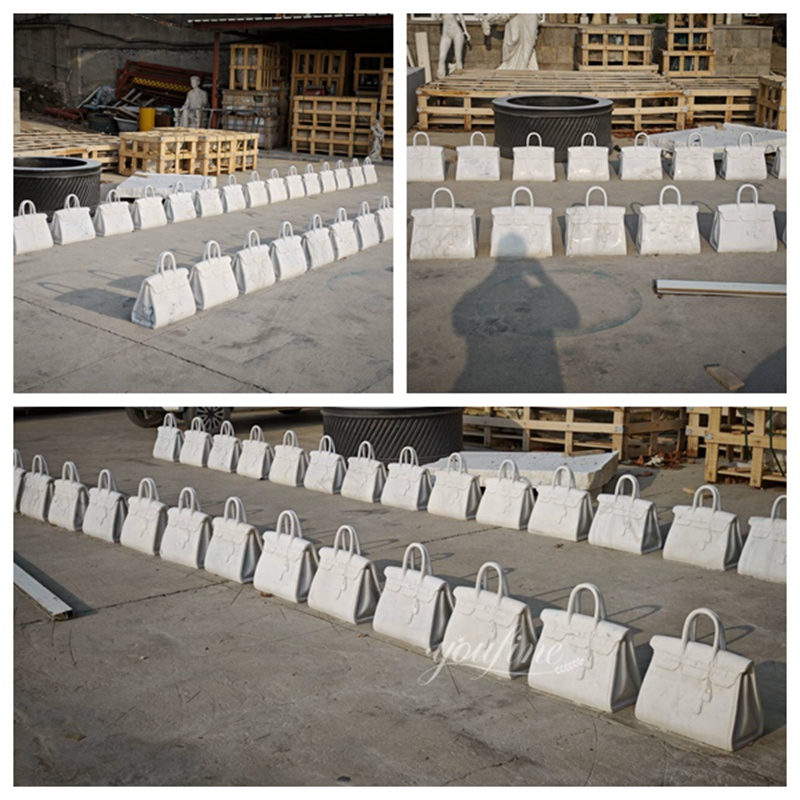 dozens of white marble bags from YouFine factory