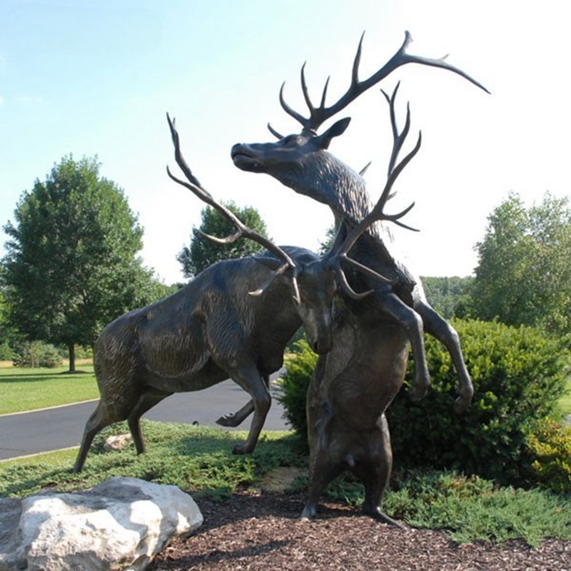 fighting deer sculpture