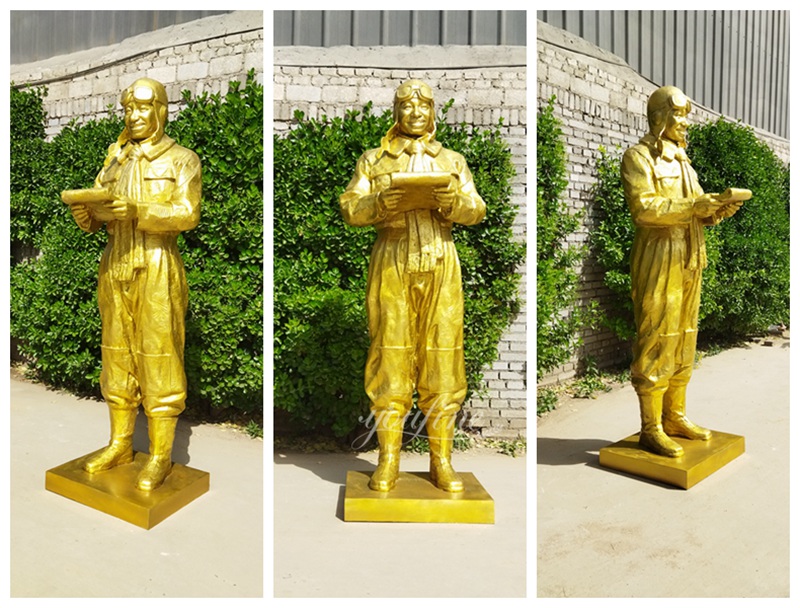 gold bronze pilot sculpture