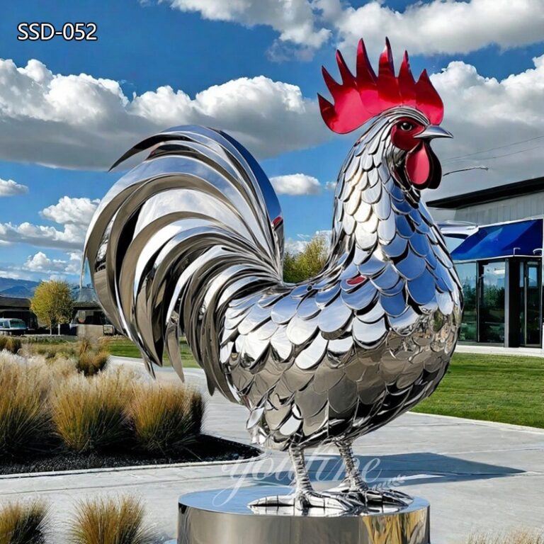 large polished stainless steel chicken sculpture