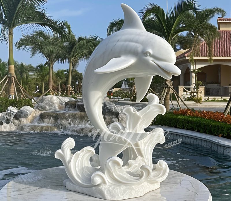 large white marble dolphin sculpture