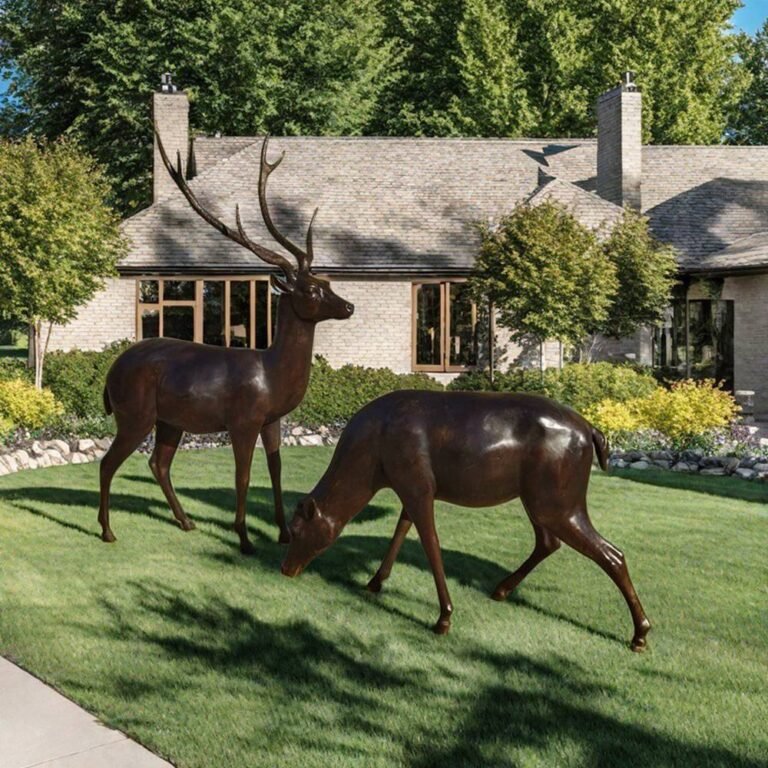 a pair of life size bronze deer garden statue