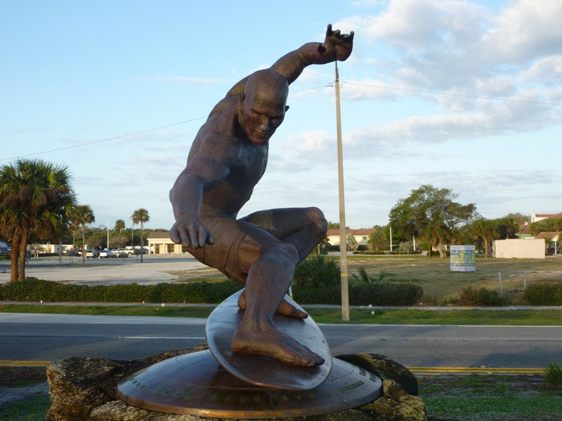 life-size bronze surfer sculpture