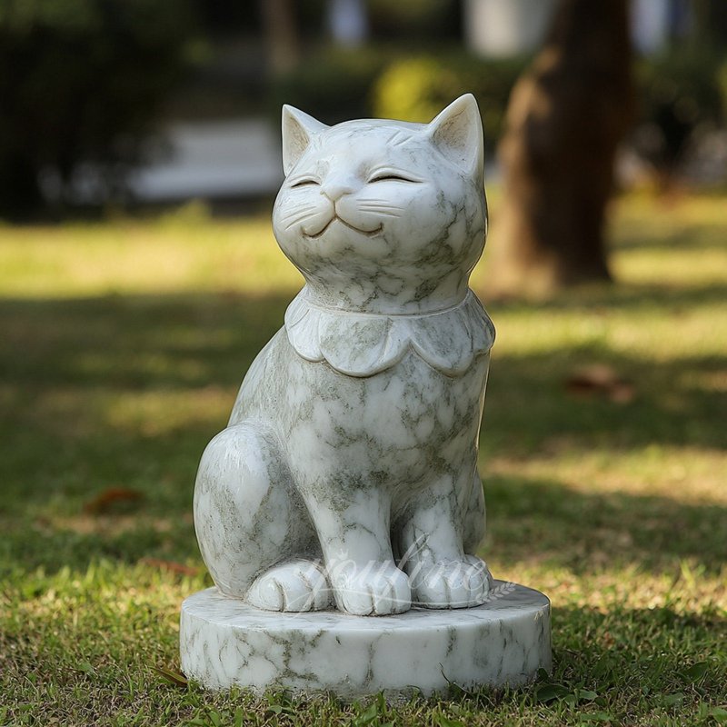 adorable smiling white marble cat statue