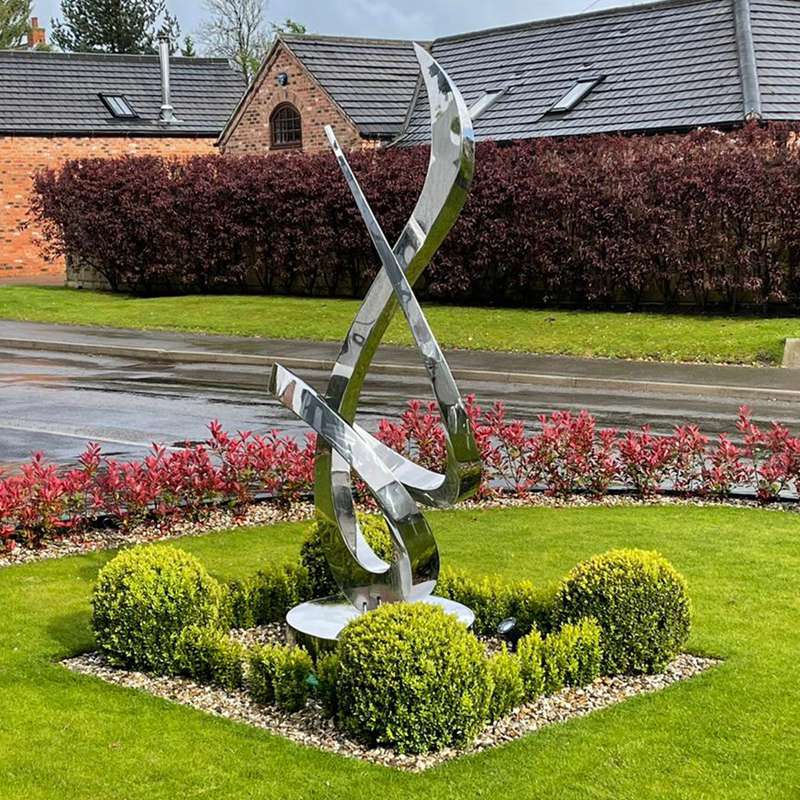 stainless steel abstract growth sculpture in the courtyard