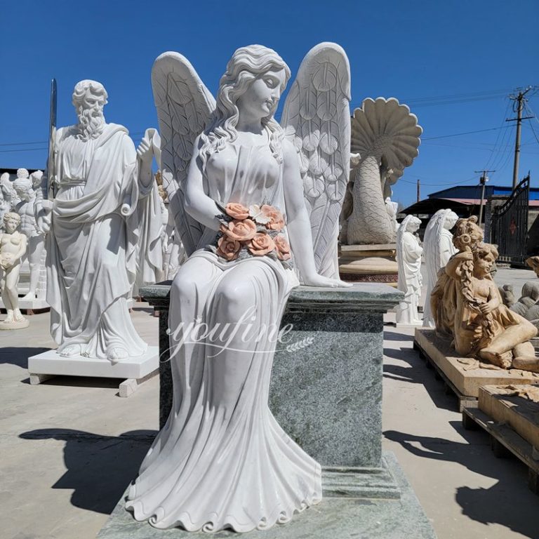 white marble angel headstone