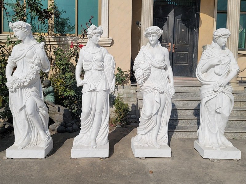 white marble four seasons statues